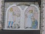 Zubaři nebyli, zdá se, oblíbení ani ve středověku (detail výzdoby na fasádě).